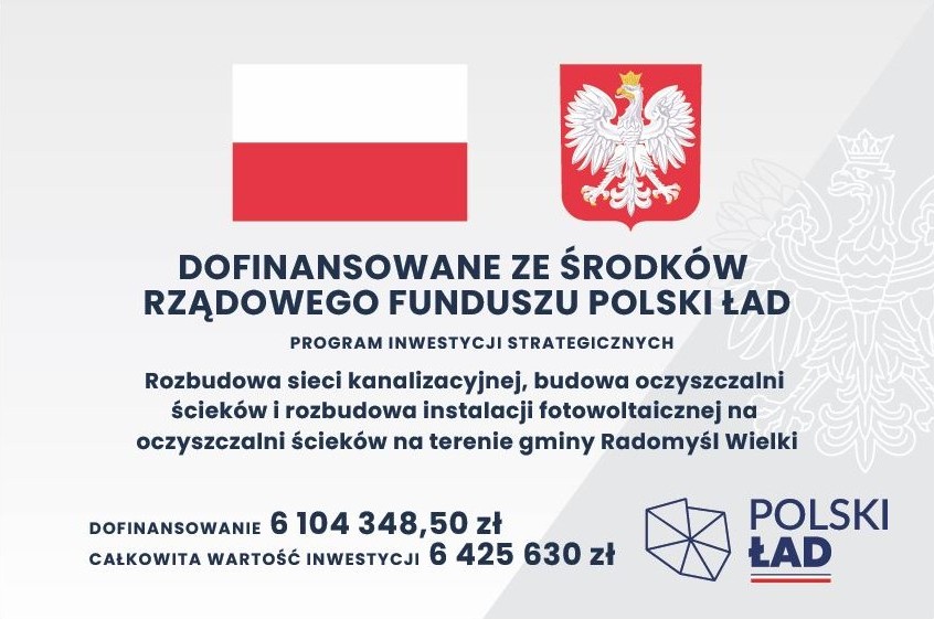 Tablica promocyjno-informacyjna dot. zadania przedsięwzięcia dotyczącego budowy sieci kanalizacyjnej w Żarówce i Dulczy Wielkiej oraz oczyszczalni w Radomyślu Wielkim, rozbudowy instalacji fotowoltaicznej na oczyszczalni ścieków w Partyni.